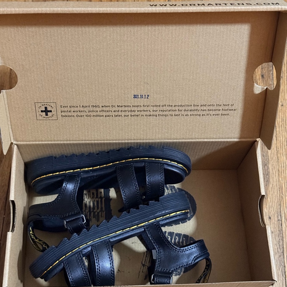 Dr. Martens Kids Black Leather Strap Sandals with Yellow Stitching